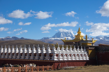 Tagong temple and Tibetan holy mountain Mt. Yala and Sichuan, China.の写真素材