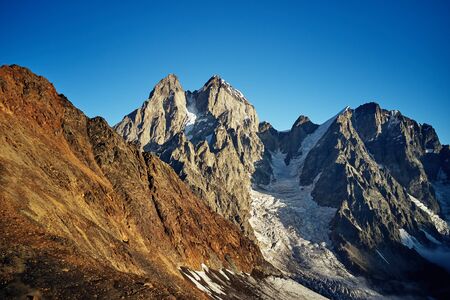 Ushba, a mountain in Svaneti, the village of Mestia Georgia.の写真素材