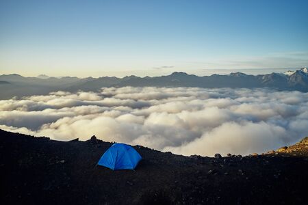 Tent on the background of Ushba. Dawn in the mountains of Svanetiの写真素材