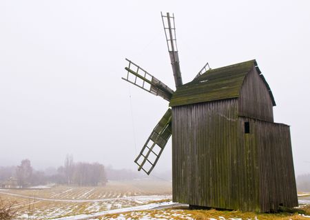 windmill in ukranian village at winter timeの写真素材