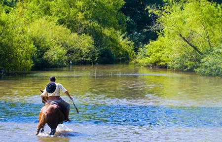TACUAREMBO , URUGUAY - MAR 07 2009 : a  participant in the annual festival of  "Patria Gaucha"のeditorial素材