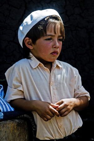 TTACUAREMBO , URUGUAY - MAR 07 2009 : a  participant boy in the annual festival of  "Patria Gaucha"のeditorial素材