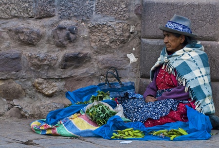 Cusco , Peru - May 27 : Peruvian woman in a market in Cusco Peru , May 27 2011のeditorial素材