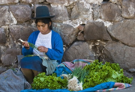 Cusco , Peru - May 27 : Peruvian woman in a market in Cusco Peru , May 27 2011のeditorial素材