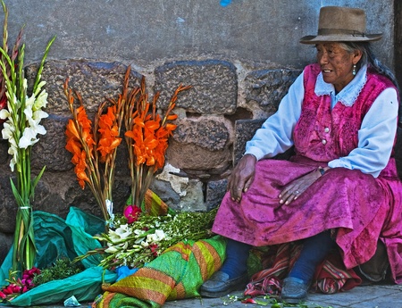 Cusco , Peru - May 27 : Peruvian woman in a market in Cusco Peru , May 27 2011のeditorial素材