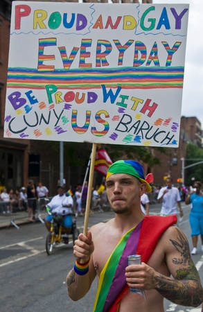 NEW YORK -  JUNE 26 : An unidentified participant celebrates gay pride parade after passing the same sex marrige bill in New York city on June 26 2011.のeditorial素材