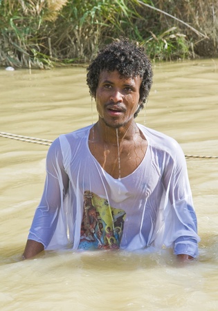QASER EL YAHUD , ISRAEL - JAN 19 : Unidentified Ethiopian orthodox Christian man  participates in...