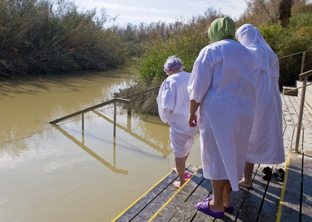 QASR AL YAHUD , ISRAEL - JAN 18 : Unidentified pilgrim women during baptising ritual the epiphany in the baptismal site Qasr al yahud in January 18 2012のeditorial素材