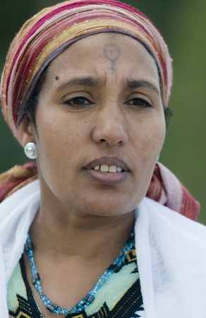 JERUSALEM - NOV 24 : Portrait of Ethiopian Jew woman during the Sigd holiday in Jerusalem . Israel on November 24 2011 , The Jewish Ethiopean community celebrates the Sigd annualy in Jerusalemのeditorial素材