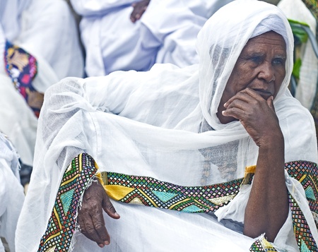 JERUSALEM - APRIL 14 : Ethiopian Orthodox worshiper await the start of the Holy fire ceremony at the Ethiopian section of the Holy Sepulcher in Jerusalm Israel on April 14 2012のeditorial素材