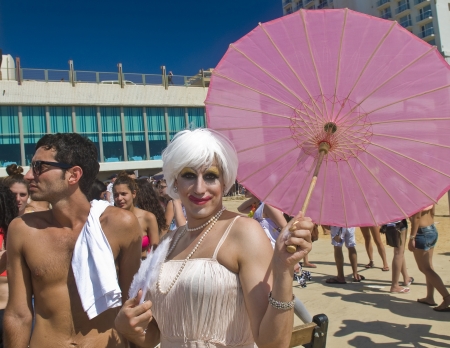 TEL AVIV , ISRAEL - JUNE 08  : An unidentified Israelis takes part in a beach party at Gordon beach followed the annual Gay pride in Tel Aviv on June 08 2012 のeditorial素材