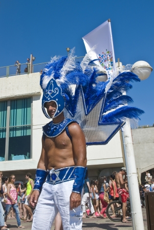 TEL AVIV , ISRAEL - JUNE 08  : An unidentified costumed Israeli man takes part in a beach party at Gordon beach followed the annual Gay pride in Tel Aviv on June 08 2012 のeditorial素材