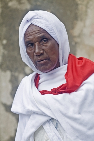 JERUSALEM - APRIL 14 : Ethiopian Orthodox worshiper await the start of the Holy fire ceremony at the Ethiopian section of the Holy Sepulcher in Jerusalm Israel on April 14 2012のeditorial素材