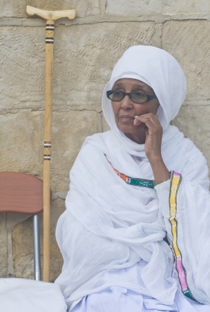 JERUSALEM - APRIL 14 : Ethiopian Orthodox worshiper await the start of the Holy fire ceremony at the Ethiopian section of the Holy Sepulcher in Jerusalm Israel on April 14 2012のeditorial素材