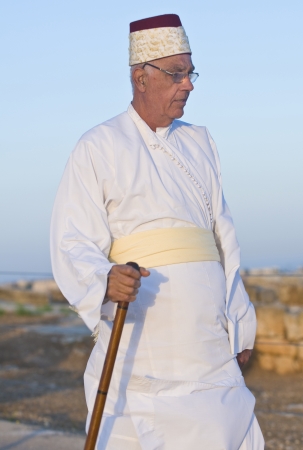 NABLUS, WEST BANK - JUNE 24 : Member of the ancient Samaritan community during the holy day of Shavuot in Mount Gerizim on June 24 2012, Shavuot is an holyday commemoretas the anniversary of the day god have given the Torah to the Israelitesのeditorial素材