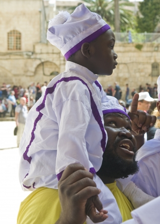 JERUSALEM - APRIL 05 : Nigerian pilgrims visit the church of the Holy Sepulcher in Jerusalem Israel during Easter on April 05 2012のeditorial素材