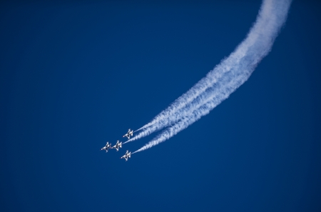 LAS VEGAS - NOVEMBER 11: Thunderbird F-16 Aircrafts performing in an air show on November 11, 2012 in Las Vegas,USA. The Thunderbirds are the air demonstration squadron of the United States Air Forceのeditorial素材
