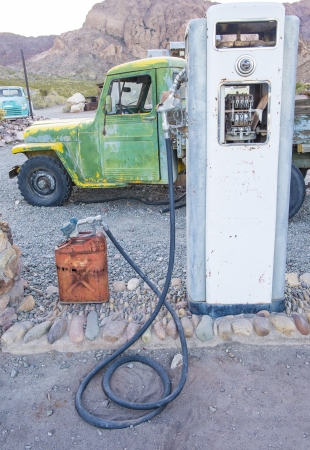 NELSON , USA - NOV 25 : Old rusty truck and old fuel pump in Nelson Nevada ghost town on November 25 ,2012のeditorial素材