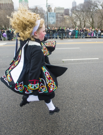 CHICAGO - MARCH 16 : Irish dancers participate at the annual Saint Patrick's Day Parade in Chicago on March 16 2013のeditorial素材