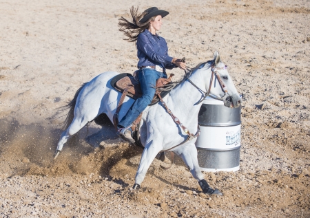 LAS VEGAS - MAY 17 : Cowgirl Participant in a Barrel racing competition at the Helldorado Days Professional Rodeo in Las Vegas , USA on May 17 2013 のeditorial素材