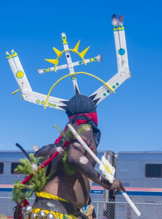 GALLUP , NEW MEXICO - AUGUST 10 :Apache dancer with traditional costume participates at the 92 annual Inter-tribal ceremonial parade on August 10 , 2013 in Gallup New-Mexicoのeditorial素材