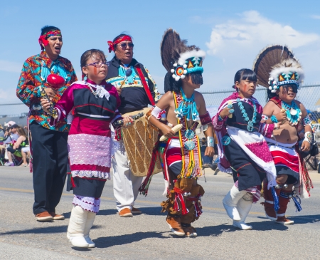 GALLUP , NEW MEXICO - AUGUST 10 : Native Americans with traditional costume participates at the 92 annual Inter-tribal ceremonial parade on August 10 , 2013 in Gallup New-Mexicoのeditorial素材