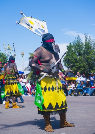 GALLUP , NEW MEXICO - AUGUST 10 :Apache dancers with traditional costume participates at the 92 annual Inter-tribal ceremonial parade on August 10 , 2013 in Gallup New-Mexicoのeditorial素材