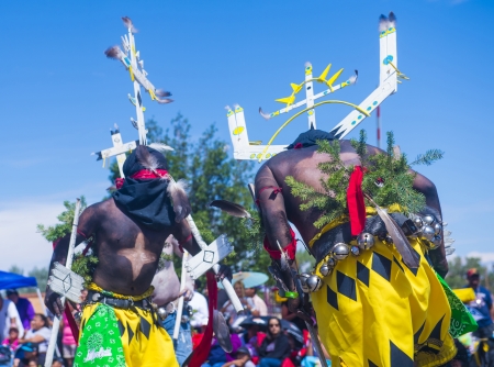 GALLUP , NEW MEXICO - AUGUST 10 :Apache dancers with traditional costume participates at the 92 annual Inter-tribal ceremonial parade on August 10 , 2013 in Gallup New-Mexicoのeditorial素材