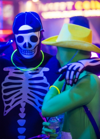 LAS VEGAS - OCT 14 : Runners participates at the GlowRun race in Las Vegas on October 14 2013  , The Glowrun is 5K Annual race where the runners run with glowing and colorful costumesのeditorial素材