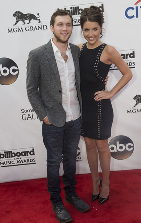 LAS VEGAS - MAY 18 :  Singer/songwriter Phillip Phillips (L) and Hannah Blackwell attend the 2014 Billboard Music Awards at the MGM Grand Garden Arena on May 18 , 2014 in Las Vegas.のeditorial素材