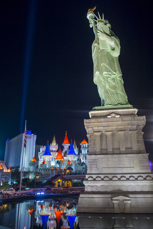 LAS VEGAS - MAY 12: The Excalibur Hotel and Casino and a model of the Statue of Liberty in Las Vegas on May 12, 2014 , The Hotel was named after King Arthur's sword and opened in 1990のeditorial素材