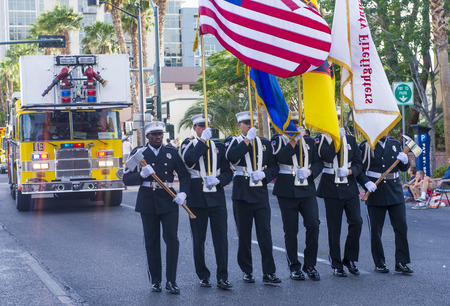 LAS VEGAS - MAY 17 : Firefighters participates at the Helldorado Days Parade held in Las Vegas Nevada on May 17 2014 ,the parade celebrating the heritage and diversity of the American Westのeditorial素材