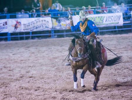 LAS VEGAS - MAY 16 : Cowboy Participating in the Helldorado days Rodeo , A professional rodeo held in Las Vegas, Nevada on May 16 , 2014のeditorial素材