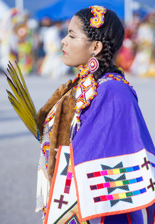 LAS VEGAS - MAY 24 : Native American woman takes part at the 25th Annual Paiute Tribe Pow Wow on May 24 , 2014 in Las Vegas Nevada. Pow wow is native American cultural gathernig event.のeditorial素材