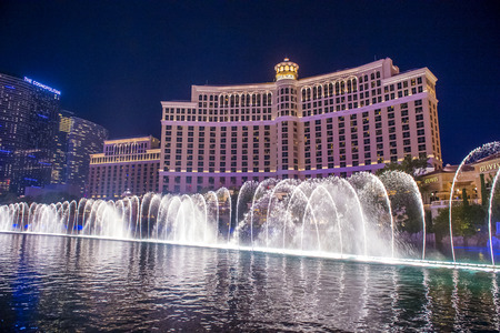 LAS VEGAS - JULY 03 : Bellagio hotel and the dancing fountains in Las Vegas on July 03 2014. Bellagio is a luxury hotel and casino located on the Las Vegas Strip. The Bellagio opened on 1998.のeditorial素材