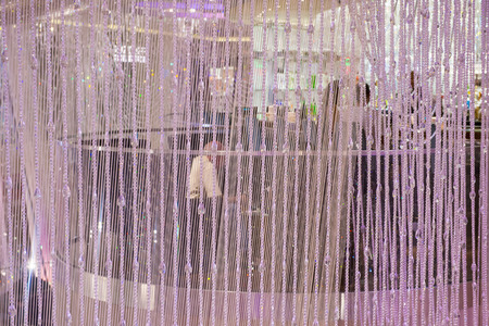 LAS VEGAS - July 21 : The Chandelier Bar at the Cosmopolitan Hotel & Casino in Las Vegas on July 21 2014. This tri-level chandelier encases the hotels 3 bars in illuminated crystals.のeditorial素材