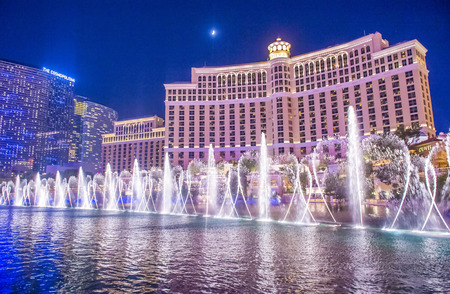LAS VEGAS - JULY 03 : Bellagio hotel and the dancing fountains in Las Vegas on July 03 2014. Bellagio is a luxury hotel and casino located on the Las Vegas Strip. The Bellagio opened on 1998.のeditorial素材