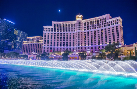 LAS VEGAS - JULY 03 : Bellagio hotel and the dancing fountains in Las Vegas on July 03 2014. Bellagio is a luxury hotel and casino located on the Las Vegas Strip. The Bellagio opened on 1998.のeditorial素材