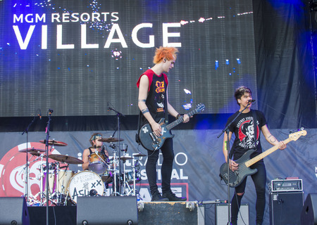 LAS VEGAS - SEP 20: Rock band 5 Seconds of Summer performs on stage at the 2014 iHeartRadio Music Festival Village on September 20, 2014 in Las Vegas.のeditorial素材
