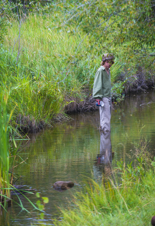FORT BRIDGER , WYOMING - AUG 30 : Unidentified participant in the Fort Bridger Rendezvous held in Fort Bridger Wyoming on August 30 2014. Rendezvous is a mountain man celebration of the Fur Trade Era のeditorial素材