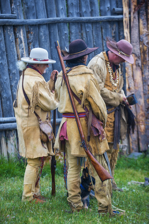 FORT BRIDGER , WYOMING - AUG 30 : Unidentified participants in the Fort Bridger Rendezvous held in Fort Bridger Wyoming on August 30 2014. Rendezvous is a mountain man celebration of the Fur Trade Era のeditorial素材