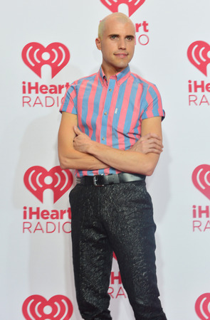 LAS VEGAS - SEP 19: Tyler Glenn of Neon Trees attends the 2014 iHeartRadio Music Festival at the MGM Grand Garden Arena on September 19, 2014 in Las Vegas.のeditorial素材