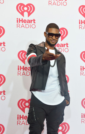 LAS VEGAS - SEP 19: Recording artist Usher attends the 2014 iHeartRadio Music Festival at the MGM Grand Garden Arena on September 19, 2014 in Las Vegas.のeditorial素材