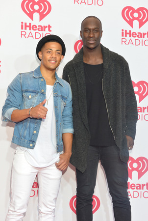 LAS VEGAS - SEP 20 : Musicians Vincent Dery (L) and Nicolas Sereba of Nico & Vinz attends the 2014 iHeartRadio Music Festival at the MGM Grand Garden Arena on September 19, 2014 in Las Vegas.のeditorial素材