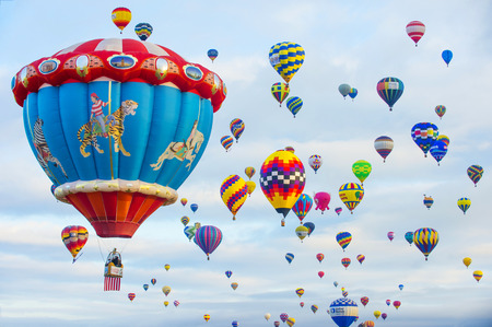 ALBUQUERQUE, NEW MEXICO - OCT 11: Balloons fly over Albuquerque on October 11, 2014 in Albuquerque, New Mexico. Albuquerque balloon fiesta is the biggest balloon event in the world.のeditorial素材
