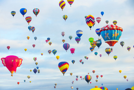 ALBUQUERQUE, NEW MEXICO - OCT 11: Balloons fly over Albuquerque on October 11, 2014 in Albuquerque, New Mexico. Albuquerque balloon fiesta is the biggest balloon event in the world.のeditorial素材