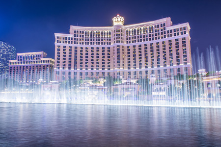 LAS VEGAS - DEC 04 : Bellagio hotel and the dancing fountains in Las Vegas on December 04 2014. Bellagio is a luxury hotel and casino located on the Las Vegas Strip. The Bellagio opened on 1998.のeditorial素材