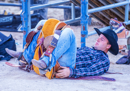 LAS VEGAS - MAY 16 : Cowboy preparing for the Helldorado days Rodeo , A professional rodeo held in Las Vegas, Nevada on May 16 , 2015のeditorial素材