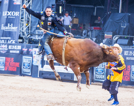 LAS VEGAS - MAY 23 : Number one Bull rider in the world  Joao Ricardo Vieira Participating in a Bull riding Competition at the Las Cowboy Standing , a PBR cometition held in Las Vegas on May 23 2015のeditorial素材