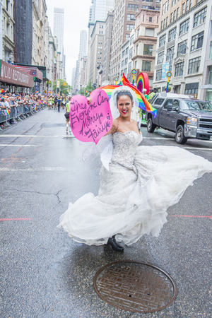 NEW YORK -  JUNE 28 : Participant march in the Gay Pride Parade on June 28, 2015 in New York City The parade is held two days after the U.S. Supreme Court's decision allowing gay marriage in the U.S.のeditorial素材